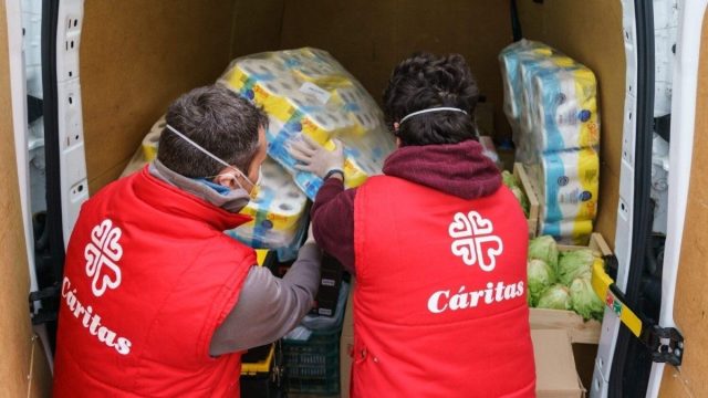 Caritas logo alongside a reference to ETA prisoners and the victims' association COVITE