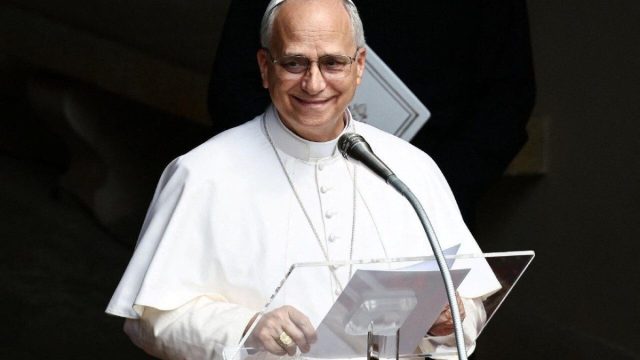 Pope Leo XIV alongside an image of Pope Francis