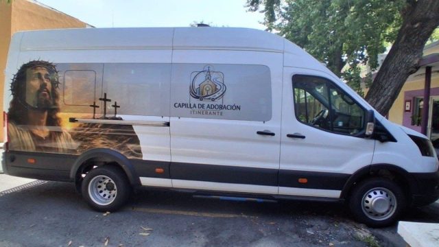 A van converted into a mobile chapel by the Archdiocese of Monterrey, fitted with an altar and kneelers for use in outlying neighborhoods