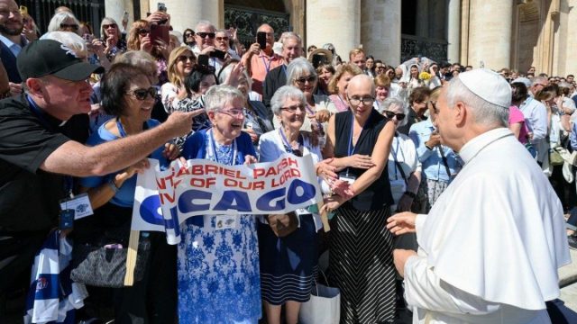 Anne Russell greeting Pope Leo XIV in St. Peter's Square after the general audience