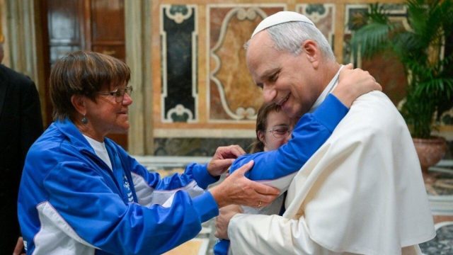 Pope Leo XIV greeting Special Olympics athletes during an audience in the Clementine Hall of the Apostolic Palace