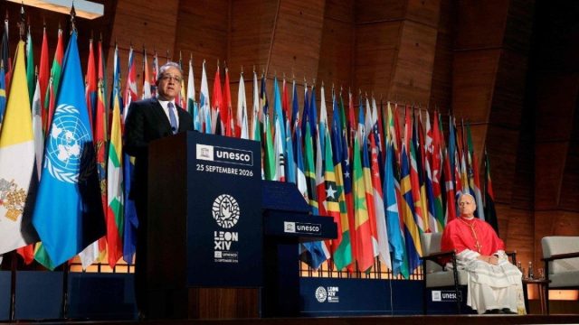 UNESCO Director-General Khaled Ahmed El-Enany Ali Ezz speaking at a lectern during his meeting with Pope Leo XIV at UNESCO headquarters in Paris
