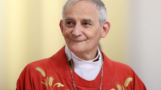 Cardinal Matteo Maria Zuppi, archbishop of Bologna, speaking into a microphone