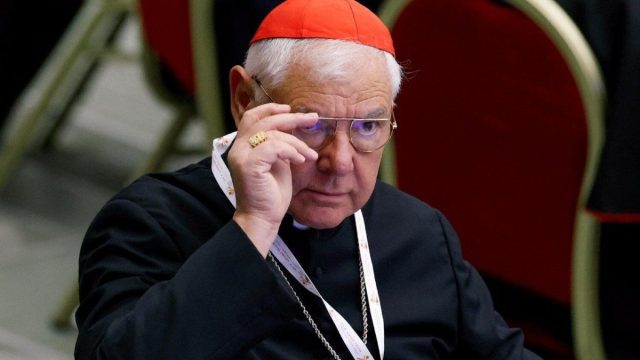 Cardinal Gerhard Ludwig Müller holding a rosary