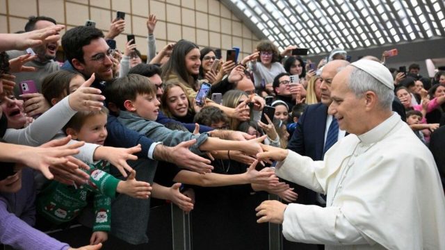 Pope Leo XIV greeting a group of young people