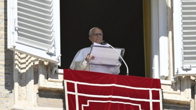 Pope Leo XIV speaking to pilgrims during the Sunday Angelus, with St. Peter's Square below
