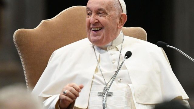 Pope Francis in a white cassock, in a photograph used to illustrate his personal diary
